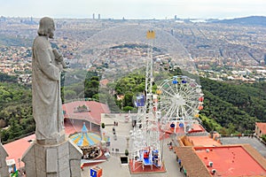 Tibidabo Amusement Park and the City of Barcelona seen from Sagrat Cor Church, Barcelona, Catalonia, Spain photo